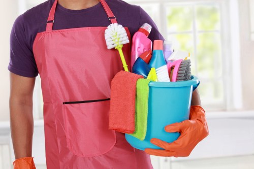 Kitchen surfaces being cleaned during move out cleaning